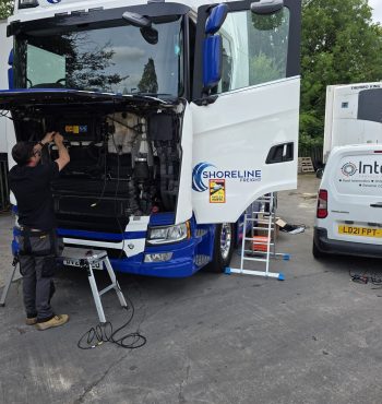 Engineer working on truck install