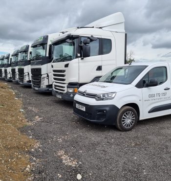 Intellistall van with articulated trucks in background