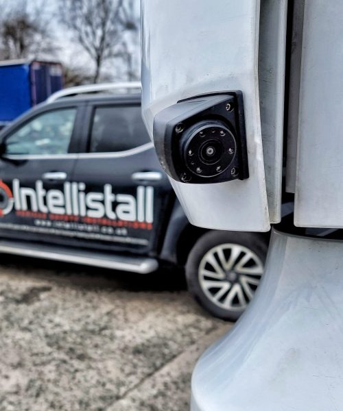 Side camera with company van in background